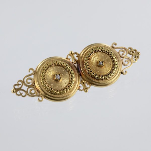 Broche ancienne double cible