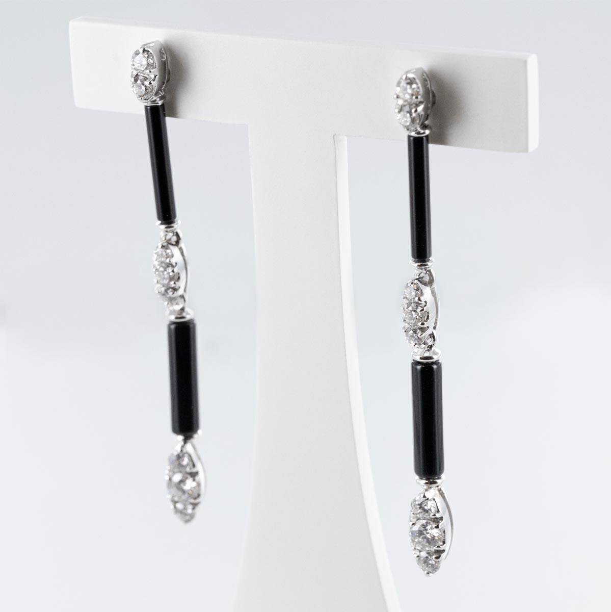 Boucles d'oreilles pendantes onyx et diamants