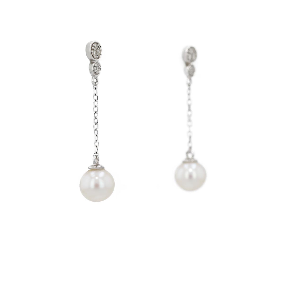Boucles d'oreilles pendantes perles sur chaîne et diamants
