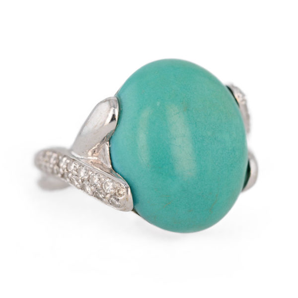 Bague pierre verte et diamants en or blanc 18 carats