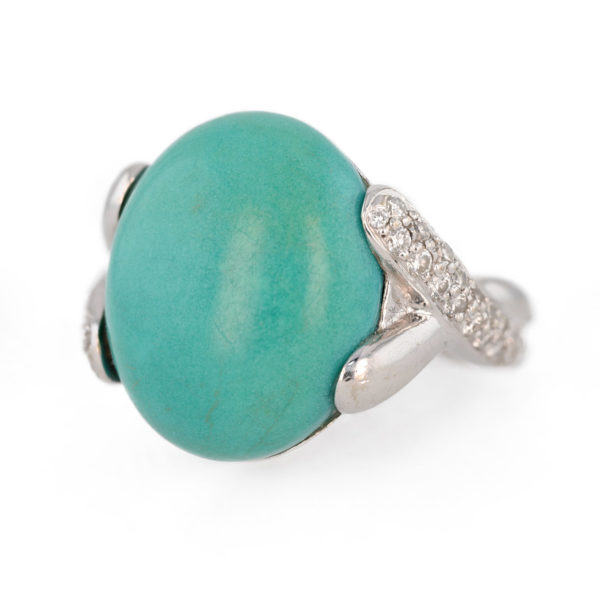 Bague pierre verte et diamants en or blanc 18 carats
