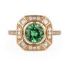 Bague Tsavorite style Art déco serti clos et entourage diamants en or jaune 18 carats