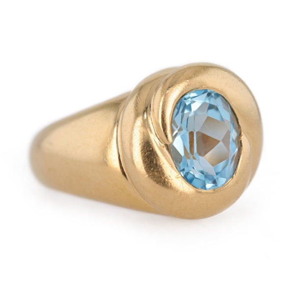 Bague jonc topaze bleue en or jaune 18 carats
