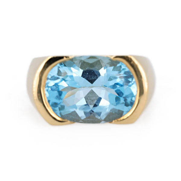 Bague jonc topaze bleue en or jaune 18 carats