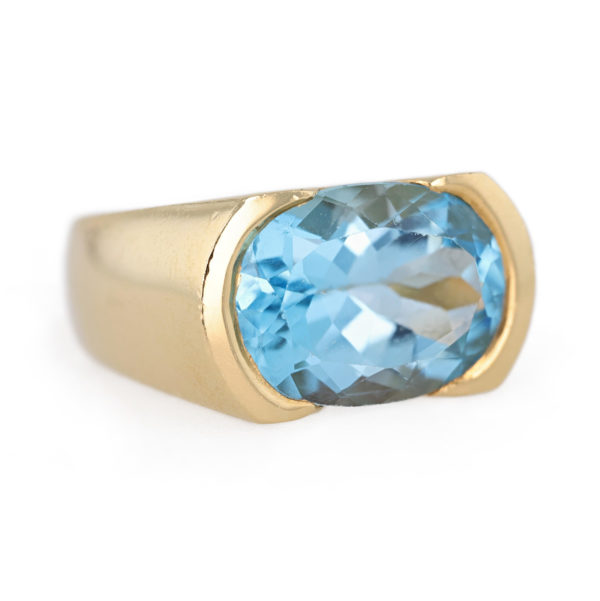 Bague jonc topaze bleue en or jaune 18 carats Bague jonc topaze bleue en or jaune 18 carats