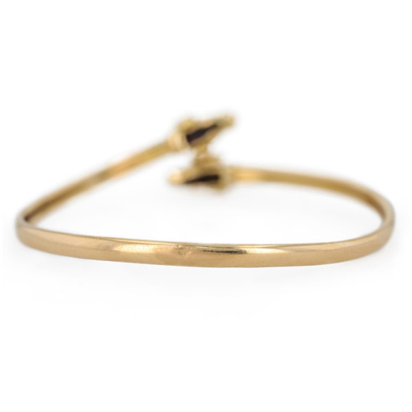 Bracelet jonc double tête de béliers en or jaune 18 carats Bracelet jonc double tête de béliers en or jaune 18 carats