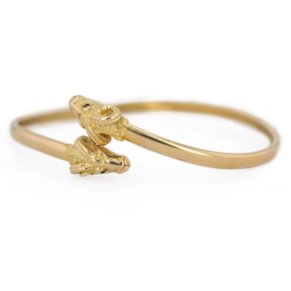 Bracelet jonc double tête de béliers en or jaune 18 carats